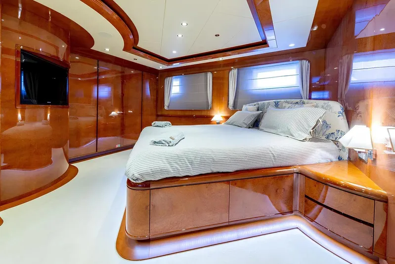 Baron Trenck Yacht Photos Pics Luxurious bedroom interior of 2011 Eurocraft SUPERYACHT 43.5 with elegant wood finishes.