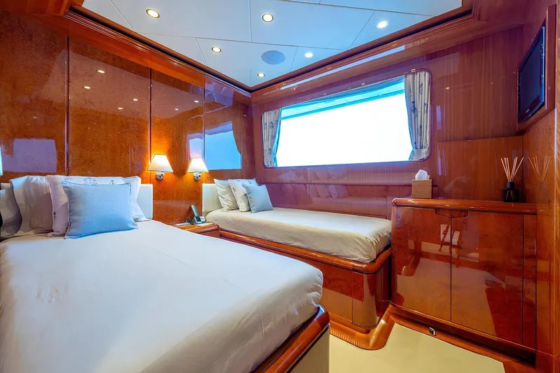Baron Trenck Yacht Photos Pics Luxurious Eurocraft SUPERYACHT 43.5 cabin interior, 2011 model, featuring elegant wood paneling and cozy beds.