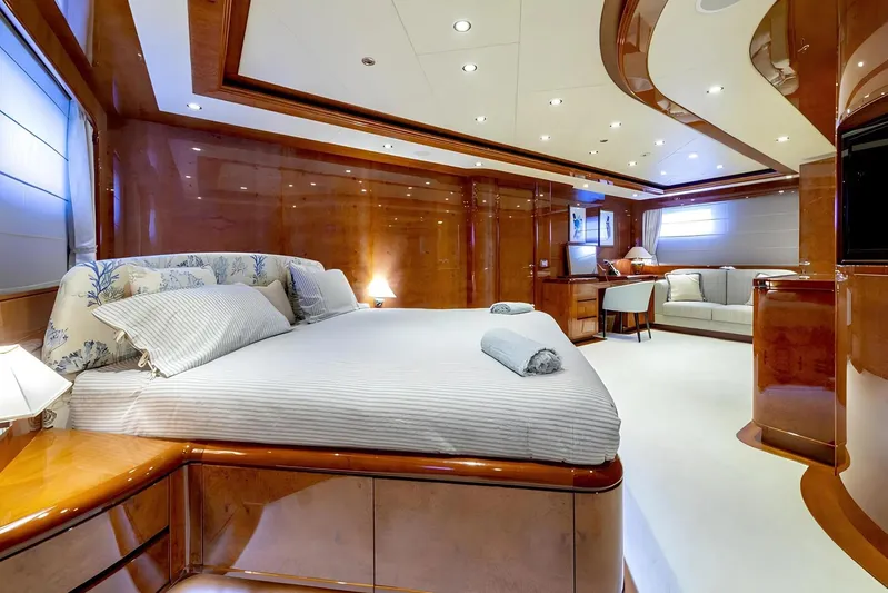 Baron Trenck Yacht Photos Pics Luxurious Eurocraft SUPERYACHT 43.5 bedroom interior, featuring elegant wood finishes and modern amenities.