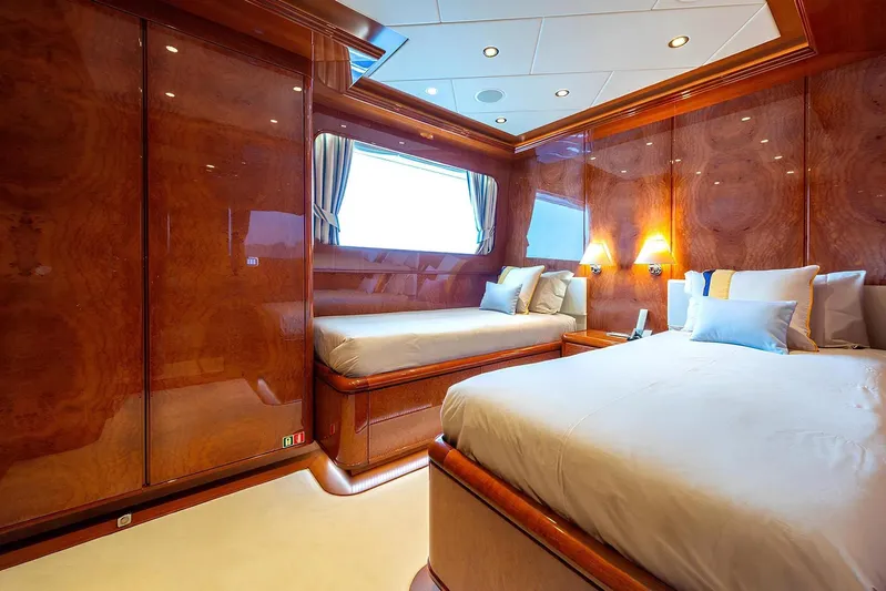 Baron Trenck Yacht Photos Pics Luxurious cabin interior of 2011 Eurocraft SUPERYACHT 43.5 with elegant wood paneling.