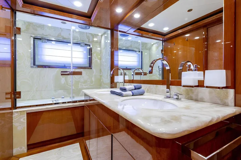 Baron Trenck Yacht Photos Pics Luxurious bathroom on Eurocraft SUPERYACHT 43.5, 2011 model, featuring elegant marble and modern fixtures.