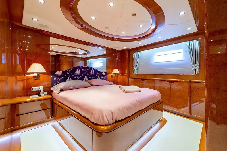Baron Trenck Yacht Photos Pics Luxurious bedroom interior of 2011 Eurocraft SUPERYACHT 43.5 with elegant wood finishes.