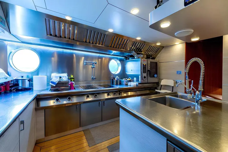 Baron Trenck Yacht Photos Pics Luxurious Eurocraft SUPERYACHT 43.5 kitchen, featuring modern stainless steel appliances and sleek design.