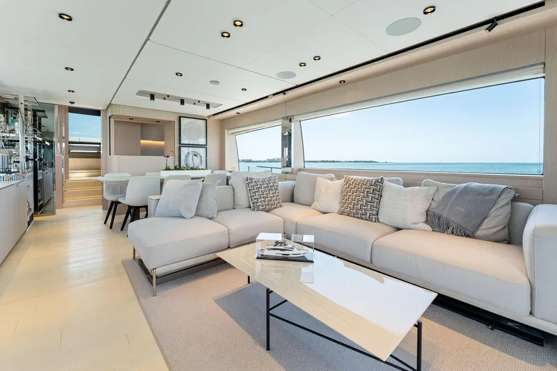 Open Sea Yacht Photos Pics Luxurious interior of 2023 Ferretti Yachts 780 with elegant seating and ocean view.