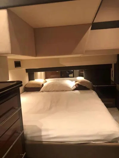  Yacht Photos Pics Luxurious bedroom interior of 2011 Marquis 500 Sport Bridge yacht.