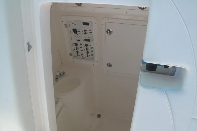  Yacht Photos Pics 2024 SeaVee 370z boat interior with control panel and sink.