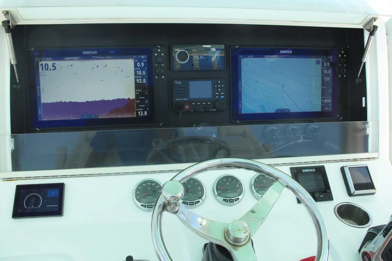  Yacht Photos Pics 2024 SeaVee 370z dashboard with navigation and control instruments.