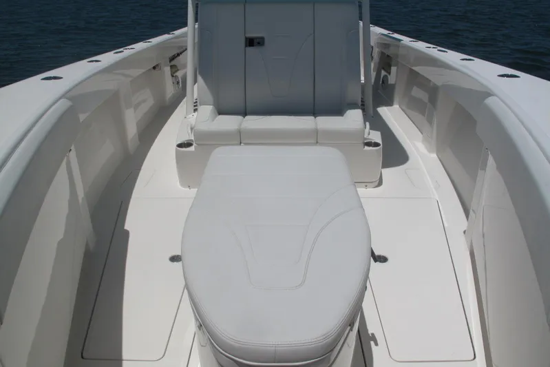  Yacht Photos Pics 2024 SeaVee 370z boat interior with white seating and spacious deck.