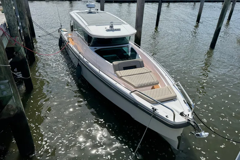  Yacht Photos Pics 2022 Axopar 37 XC CROSS CABIN boat docked in marina, top view.