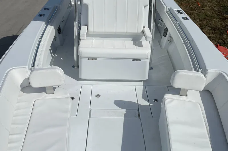  Yacht Photos Pics 2023 Contender 30 Tournament boat interior with white seating and spacious layout.