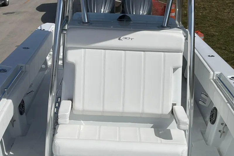  Yacht Photos Pics 2023 Contender 30 Tournament boat with white seating and stainless steel frame.