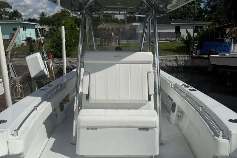  Yacht Photos Pics 2023 Contender 30 Tournament boat interior with white seating and sleek design.