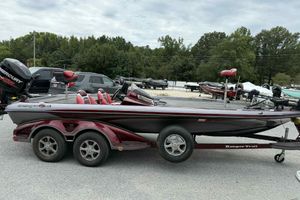 2014 Ranger Z521 Comanche bass boat on trailer, parked outdoors.