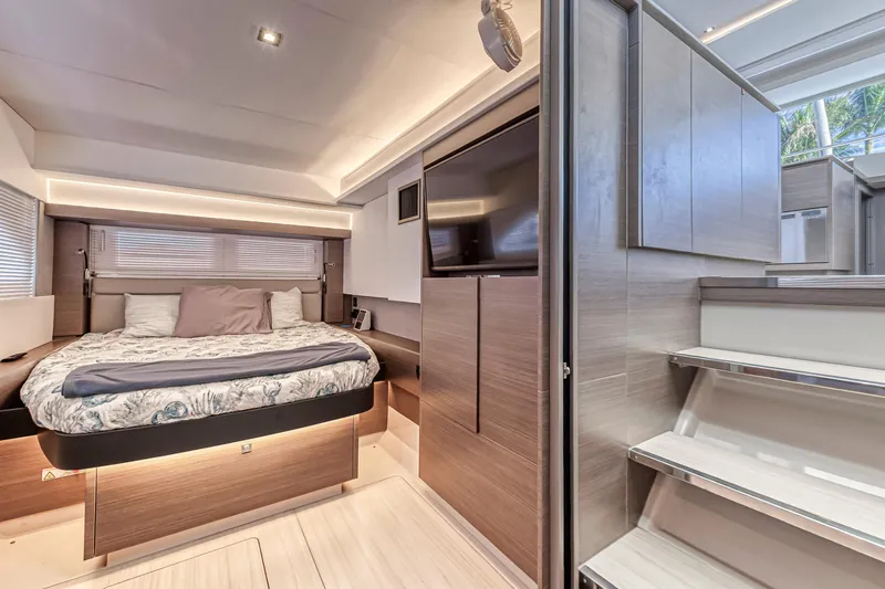 Double Feature Yacht Photos Pics Luxurious interior of 2023 Leopard 53 Powercat yacht with modern bedroom and sleek design.