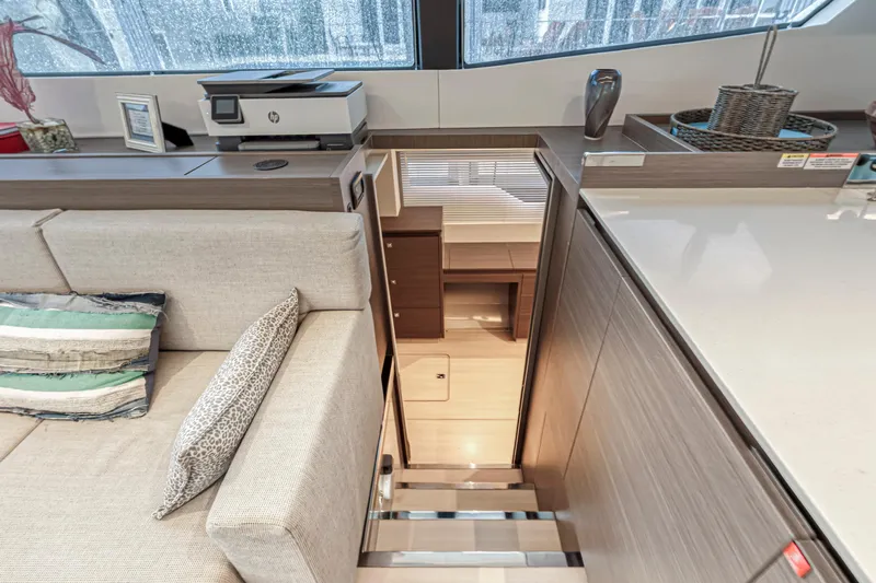 Double Feature Yacht Photos Pics Interior of 2023 Leopard 53 Powercat yacht, featuring modern design and comfortable seating.