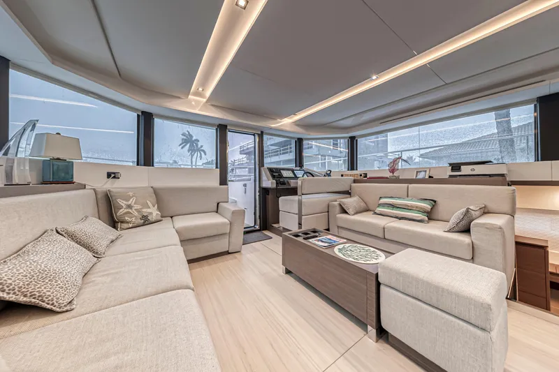 Double Feature Yacht Photos Pics Luxurious interior of 2023 Leopard 53 Powercat yacht with modern seating and elegant design.