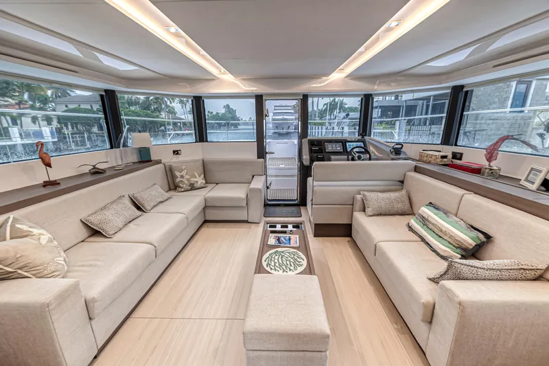 Double Feature Yacht Photos Pics Luxurious interior of 2023 Leopard 53 Powercat yacht with spacious seating and modern design.
