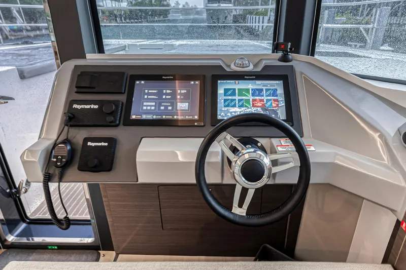 Double Feature Yacht Photos Pics Helm of 2023 Leopard 53 Powercat with advanced navigation displays and controls.