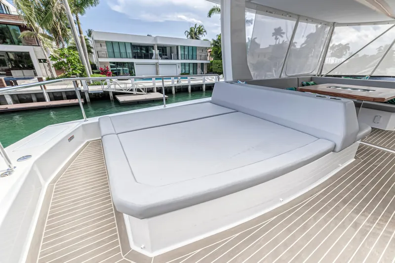 Double Feature Yacht Photos Pics 2023 Leopard 53 Powercat yacht with spacious deck and modern seating area.