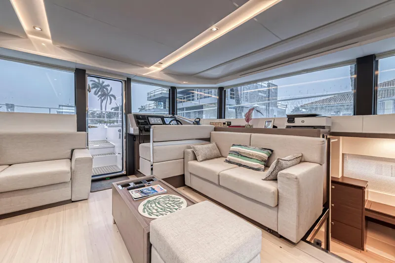 Double Feature Yacht Photos Pics Luxurious interior of 2023 Leopard 53 Powercat yacht with modern seating and elegant design.