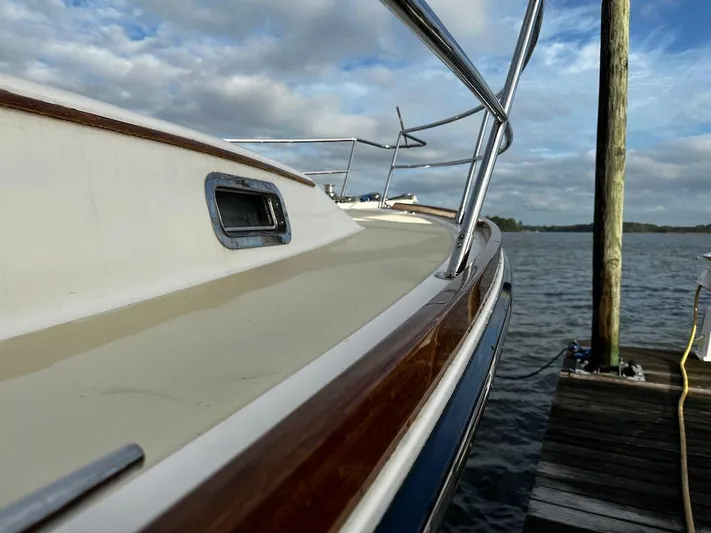 Dawn Treader Yacht Photos Pics 2008 Sabre 42 Hard Top Express yacht docked by the water.