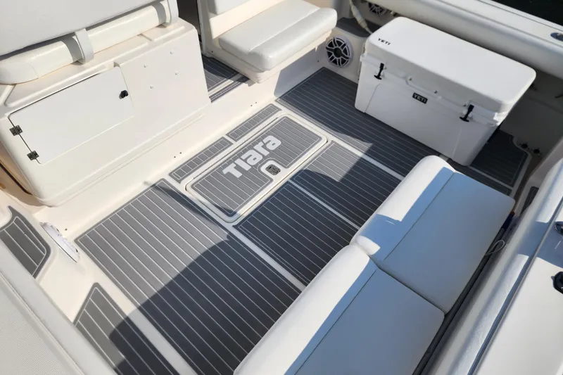  Yacht Photos Pics 2001 Tiara Yachts 3500 Open interior with seating and Yeti cooler on deck.