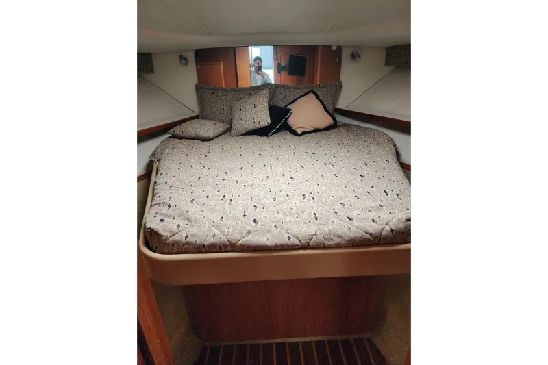  Yacht Photos Pics 2001 Tiara Yachts 3500 Open cabin with cozy bed and decorative pillows.