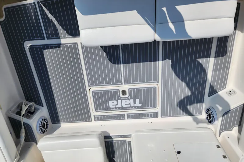  Yacht Photos Pics Tiara Yachts 3500 Open 2001 boat deck with gray and white striped flooring.