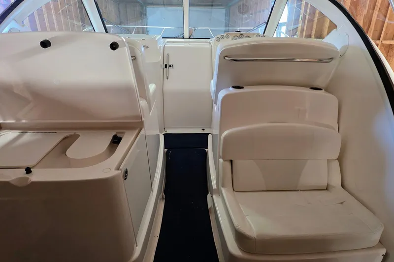  Yacht Photos Pics 2007 Tiara Yachts 3000 Open interior with white seating and dashboard view.