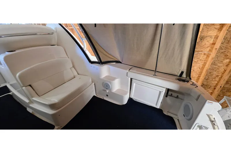  Yacht Photos Pics 2007 Tiara Yachts 3000 Open interior with seating and storage compartments.