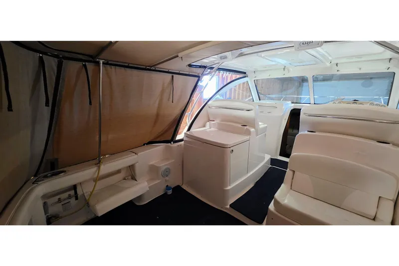  Yacht Photos Pics 2007 Tiara Yachts 3000 Open interior with seating and helm station.