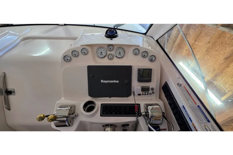  Yacht Photos Pics 2007 Tiara Yachts 3000 Open dashboard with Raymarine navigation system and control gauges.