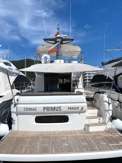 Mizar Yacht Photos Pics Azimut Magellano 53 yacht, 2017 model, docked with clear blue sky background.