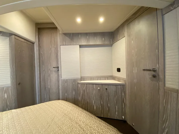 Mizar Yacht Photos Pics Interior cabin of 2017 Azimut Magellano 53 yacht with modern wood finish.