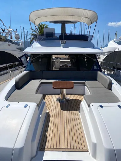 Mizar Yacht Photos Pics 2017 Azimut Magellano 53 yacht with spacious deck and seating area.