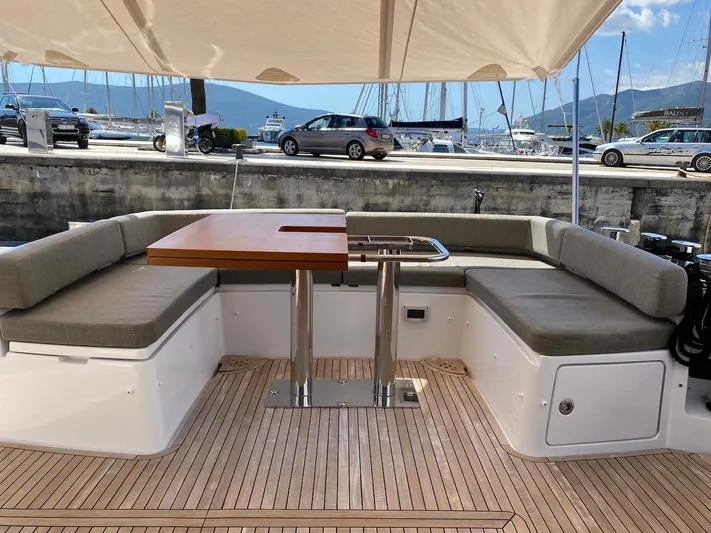 Mizar Yacht Photos Pics Azimut Magellano 53 yacht deck with seating and table, 2017 model.