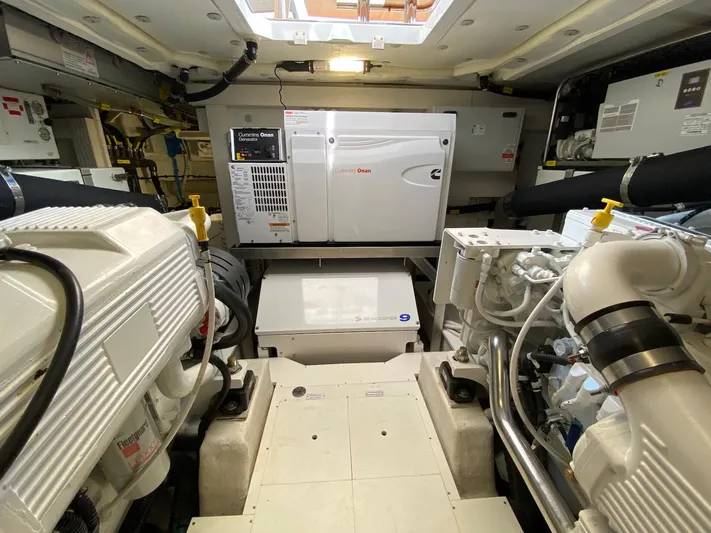 Mizar Yacht Photos Pics Engine room of 2017 Azimut Magellano 53 yacht, featuring modern equipment and machinery.