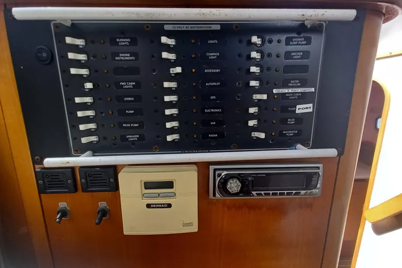 Yellowrock Yacht Photos Pics Control panel of a 1996 Alliaura Privilege 37 yacht with various switches and controls.