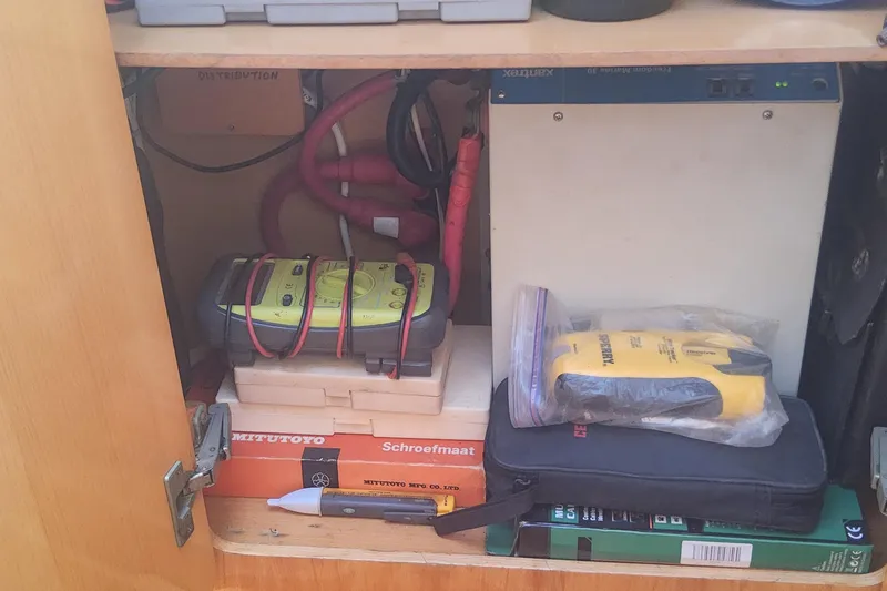 Yellowrock Yacht Photos Pics Storage cabinet with electrical equipment and tools on a 1996 Alliaura Privilege 37 yacht.