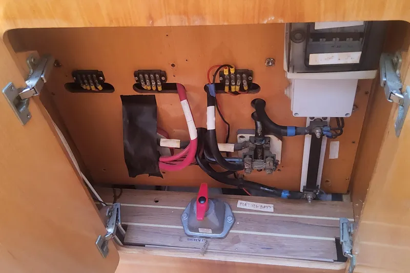 Yellowrock Yacht Photos Pics Electrical panel inside a 1996 Alliaura Privilege 37 yacht, showcasing wiring and components.