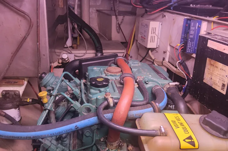 Yellowrock Yacht Photos Pics Engine room of a 1996 Alliaura Privilege 37 catamaran, showcasing mechanical components and wiring.