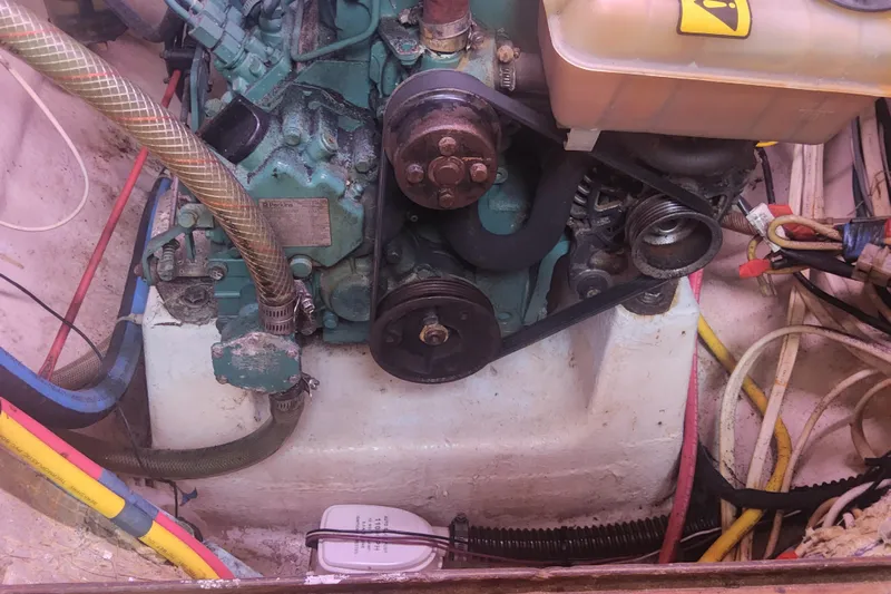 Yellowrock Yacht Photos Pics Engine compartment of a 1996 Alliaura Privilege 37 catamaran with visible hoses and belts.