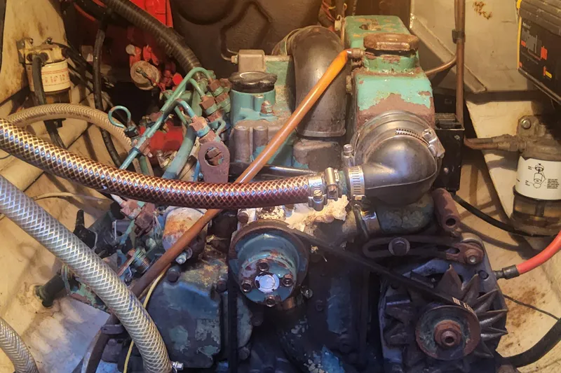 Yellowrock Yacht Photos Pics Engine compartment of a 1996 Alliaura Privilege 37 catamaran, showing mechanical components and hoses.