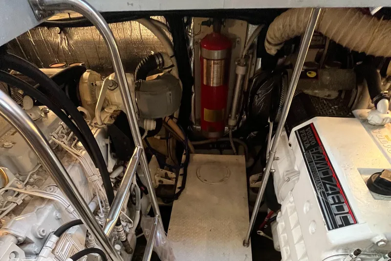 Two Can Do It II Yacht Photos Pics Engine room of 2000 Cruisers Yachts 4450 Motor Yacht with Volvo Penta components.