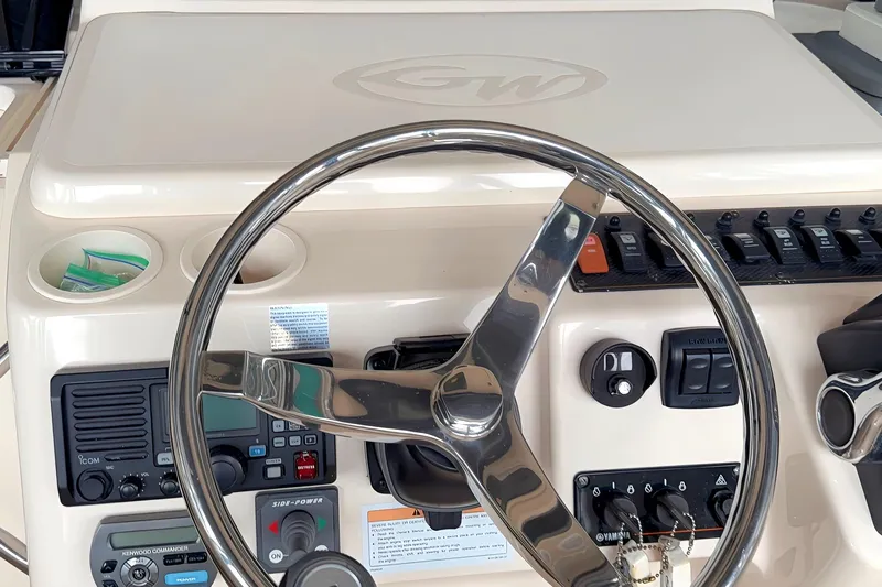 Yacht Photos Pics Steering console of 2007 Grady-White Express 305 boat with controls and gauges.