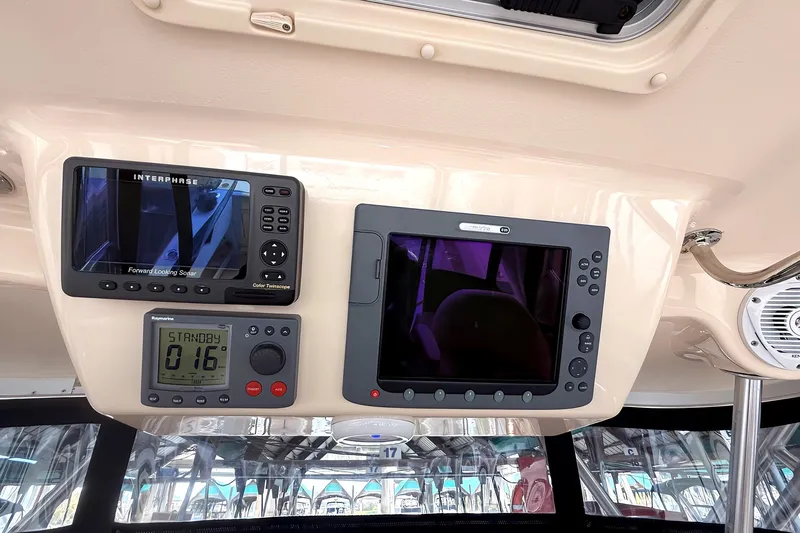  Yacht Photos Pics 2007 Grady-White Express 305 boat dashboard with navigation and sonar displays.