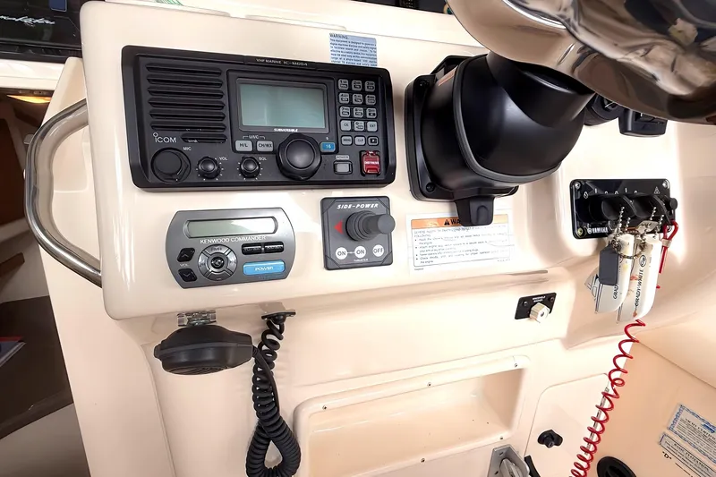  Yacht Photos Pics 2007 Grady-White Express 305 dashboard with radio and control panel.