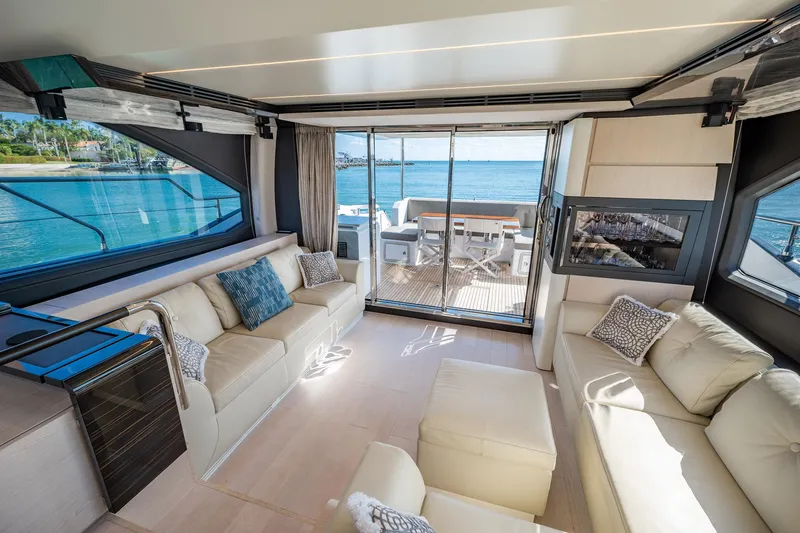 Amici Yacht Photos Pics Luxurious interior of 2017 Azimut 66 yacht with ocean view and elegant seating.