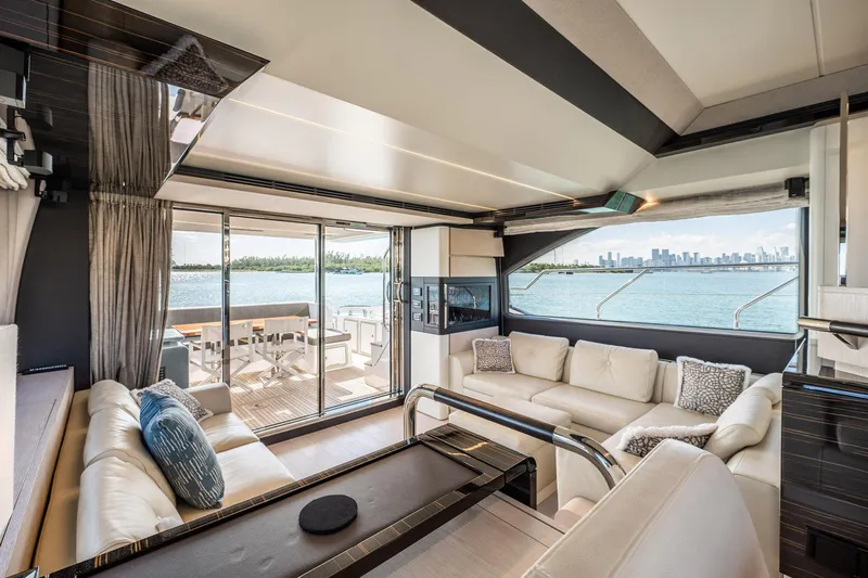 Amici Yacht Photos Pics Luxurious interior of 2017 Azimut 66 yacht with elegant seating and ocean view.