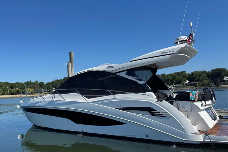  Yacht Photos Pics 2024 Galeon 425 HTS yacht docked on a sunny day, showcasing sleek design.